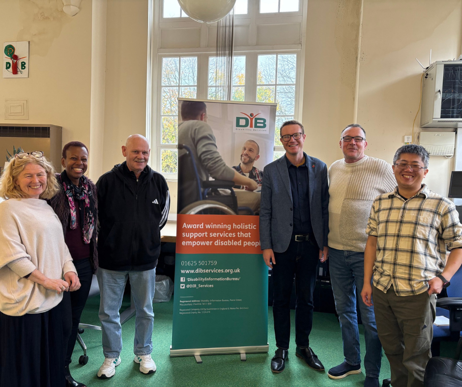 Interim DIB Manager and CVSCE Deputy CEO Sector Development, Aoife Middlemass with DIB staff and volunteers alongside Macclesfield MP Tim Rocca
