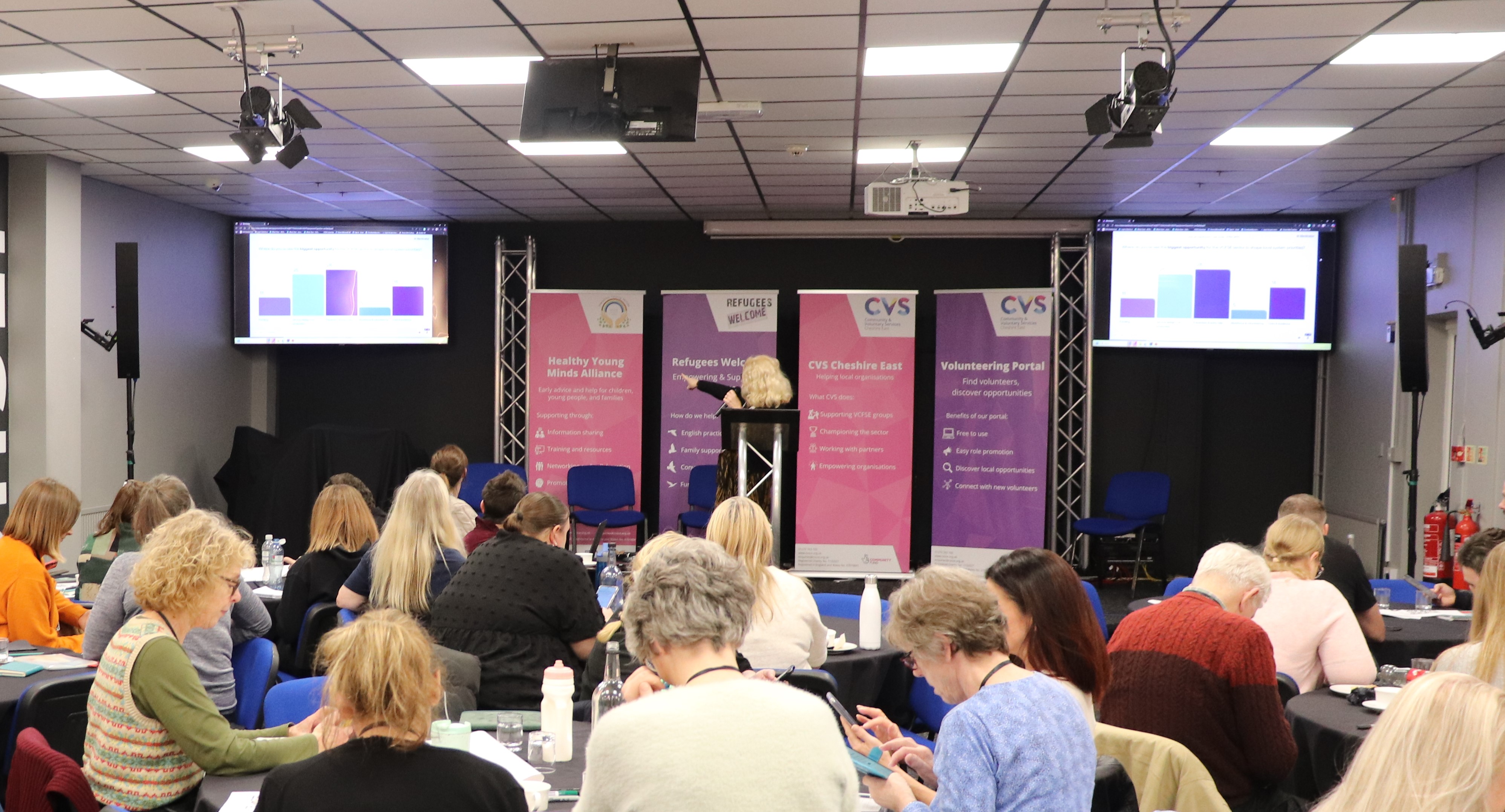Aoife Middlemass conducting data survey at the Alliance conference